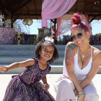 Kalea Marie Cephus and Shya L'amour can be seen smiling for the camera out in the sunny day.